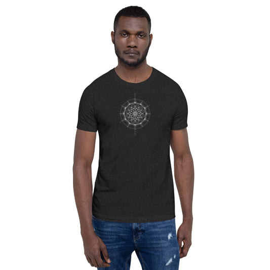 Model wearing a black T-shirt with monochrome geometric design, front view
